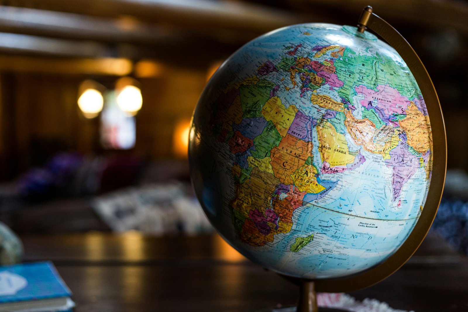 A close-up of a world globe showing Europe, Africa, and the Middle East